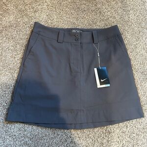 NWT Nike Golf Tour Performance Dri Fit Skirt. Built in shorts. Grey. Classic